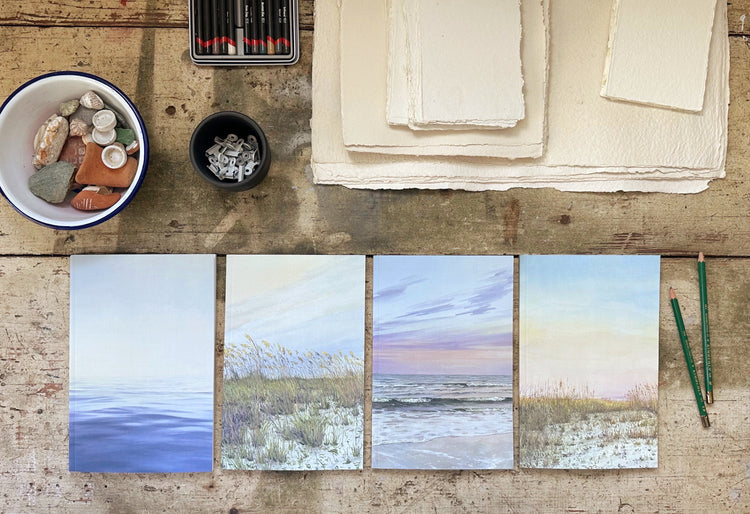 desk space with perfect bound lined journals with beach themed cover options